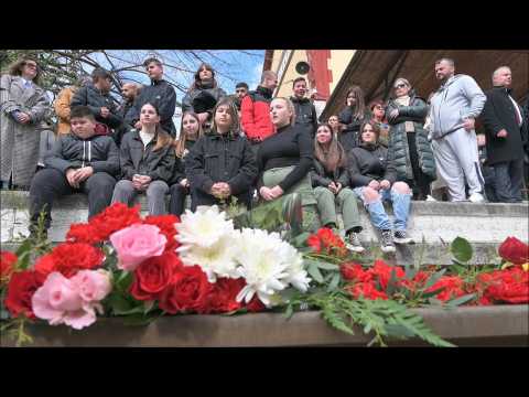 Flowers lain on tracks for victims of Greece railway disaster
