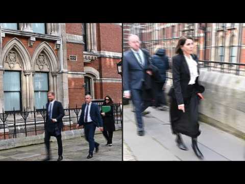 Prince Harry and others leaving the Royal Courts of Justice in London after UK privacy hearing