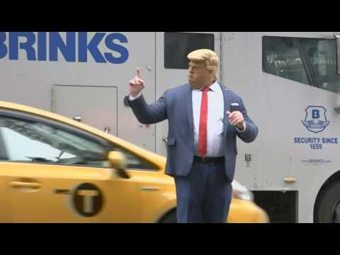 Man in Trump mask 'directs' New York traffic outside Trump Tower