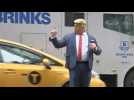 Man in Trump mask 'directs' New York traffic outside Trump Tower