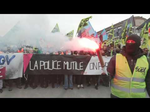 Striking railway workers demonstrate at Gare de Lyon in Paris against pension reform