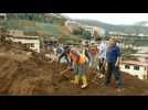 Relatives of missing dig to find beloved ones after Ecuador landslide