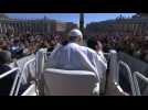 Pope greets thousands gathered in St Peter's Square as he leaves Easter Mass