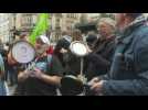 Parisians bang pots and pans during Macron speech on pension reform