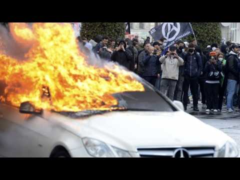 Police and protesters clash in 12th day of French rallies against pension reform