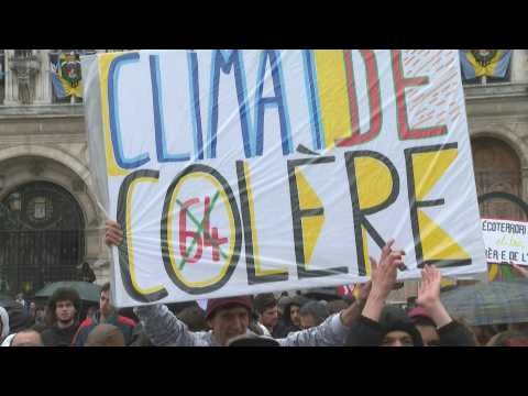 Protest in Paris after French court approves Macron pension reform
