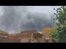 Smoke billows, gunfire heard near Khartoum's airport as deadly fighting rocks Sudan