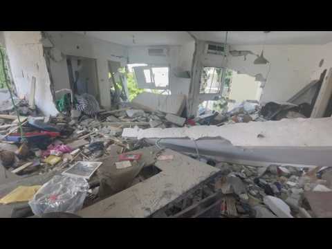 Israelis inspect destroyed apartment hit by deadly Gaza rocket