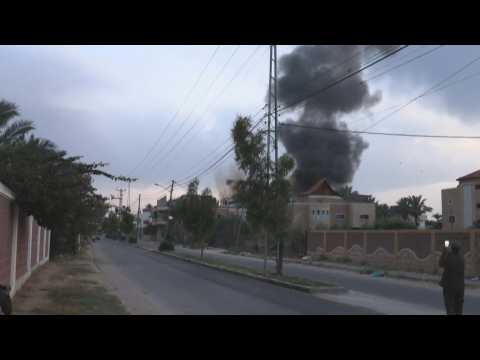 Smoke rises after strike hits house in Gaza's Deir al-Balah