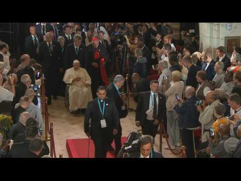 Pope Francis enters the Basilica of Notre-Dame in Marseille