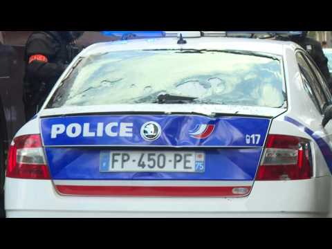 Police escort police car attacked during demonstration in Paris