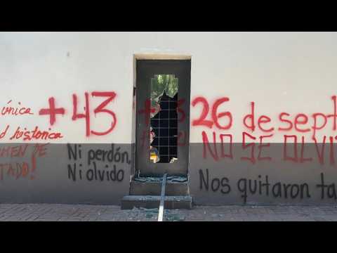 Mexican National Intelligence Centre vandalised during protest over missing students