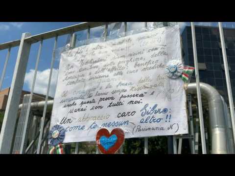 Tributes to Berlusconi laid outside Milan hospital where ex-PM died