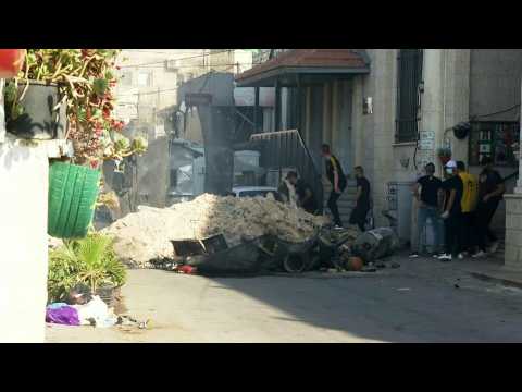 Palestinians throw stones as Israeli army strikes targets in Jenin
