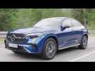 The new Mercedes-Benz GLC 400 e 4MATIC Coupe in Spectral blue Driving Video