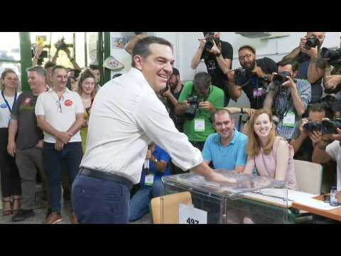 Greek opposition leader Alexis Tsipras casts his vote in Athens
