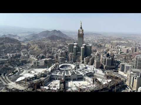 Aerial view of Mecca's Grand Mosque, clock tower, Kaaba, and Mount Arafat