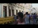 Scene outside burned house in Havana after fire killed seven