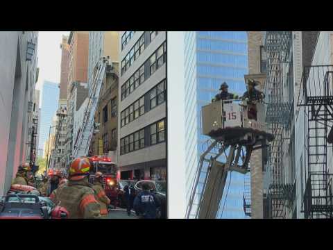 Firefighters respond to fatal parking garage collapse in New York