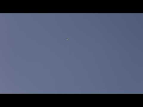 Images of smoke, reconnaissance aircraft flying over Khartoum