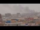 Smoke rises over Khartoum as Sudan fighting enters third week