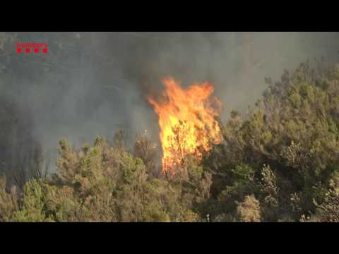 Fire near Spain's border with France spreading rapidly