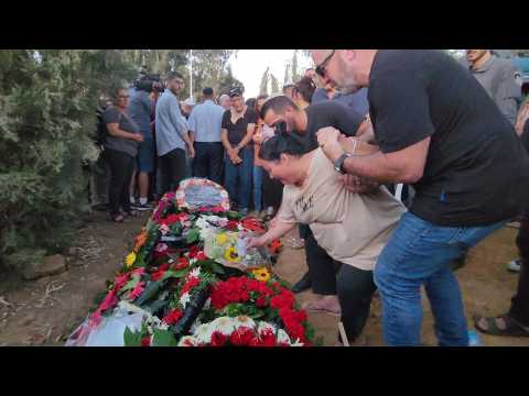 Mourners bury Israeli killed in Palestinian attack in Tel Aviv