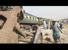 Pakistan train wreck site after at least 19 killed in derailing