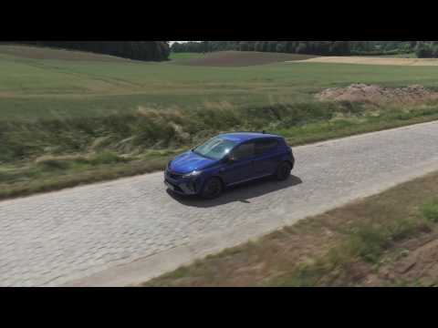 The new Renault Clio in Blue Iron Driving in the country