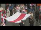 Poles march in solidarity with Belarus on vote anniversary