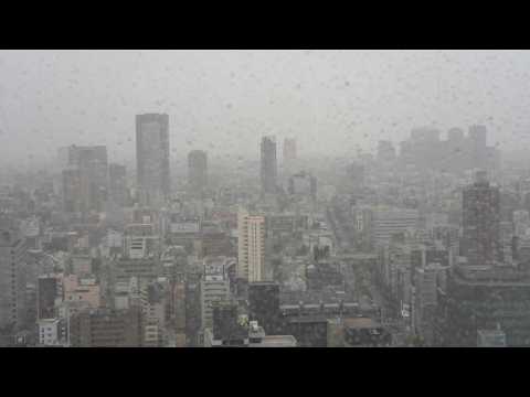Travel disruptions and heavy rain as storm Lan hits Japan
