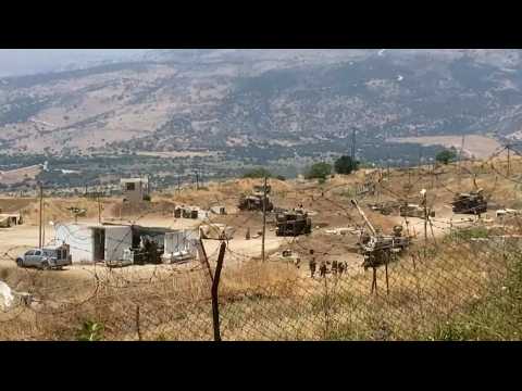 Israeli artillery stationed on Lebanon border following exchange of fire