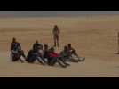 À bout de force, des migrants africains errent dans le désert entre Tunisie et Libye