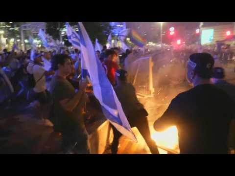 Israeli police clash with protesters after approval of key judicial reform clause