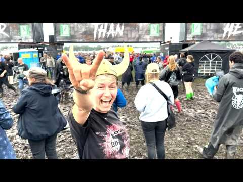 Fans arrive at mud-stricken German heavy metal festival as entry frozen