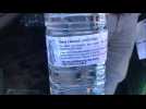 Anstaing : distribution d'eau miraculeuse lors du pèlerinage à saint Laurent