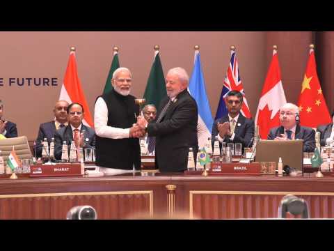 India PM Modi passes gavel to Brazil's Lula as G20 summit closes