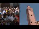 Moroccans perform Friday prayers at Marrakesh mosque