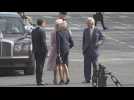 Brigitte Macron kisses Queen Camilla under the Arc de Triomphe