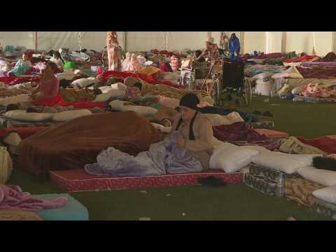Morrocans displaced by the quake wake up in makeshift shelter in Marrakesh