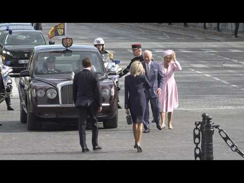 King Charles III and Queen Camilla under the Arc de Triomphe