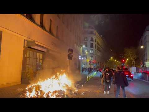 Garbage fire in Paris as demonstrators protest against Macron's imposed French pension reform