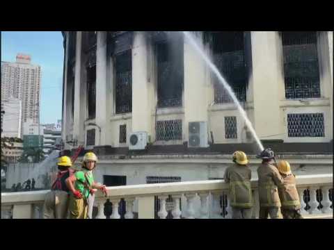 Firefighters on scene after fire destroys Manila post office