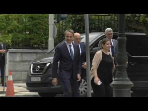 Greece's PM Kyriakos Mitsotakis arrives at Presidential palace