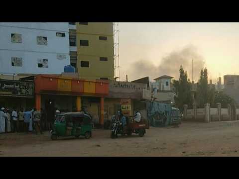 Smoke rises over Sudan's capital on day two of tense ceasefire