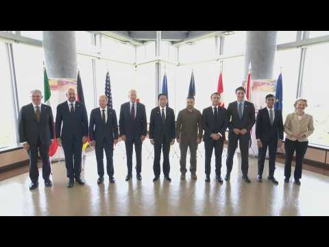 G7 leaders and Ukraine's Zelensky pose for photo during summit
