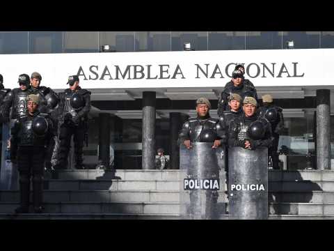 Security forces patrol main gate of Ecuadorian National Assembly