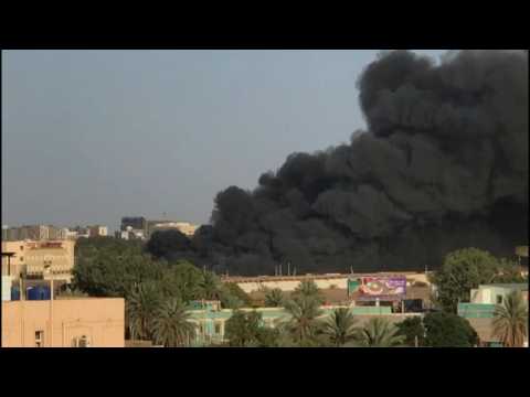 Gunfire sounds as heavy smoke billows over Sudan capital