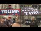 Protesters wave flags, hold up signs outside Manhattan court ahead of Trump arraignment