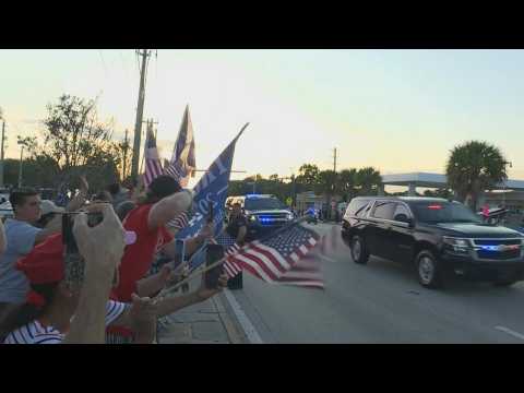 Supporters greet Trump's motorcade upon arrival in Florida